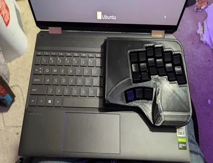 Laying down the first test print of a portajohn on a laptop