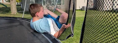 Wyatt about rolled off the trampoline. Wyatt about rolled off the trampoline.