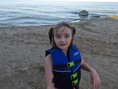 Ayla on the beach of Lake Michigan Ayla on the beach, about to jump into the chilly Lake Michigan.