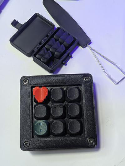 A Box Of Caps And A Macropad