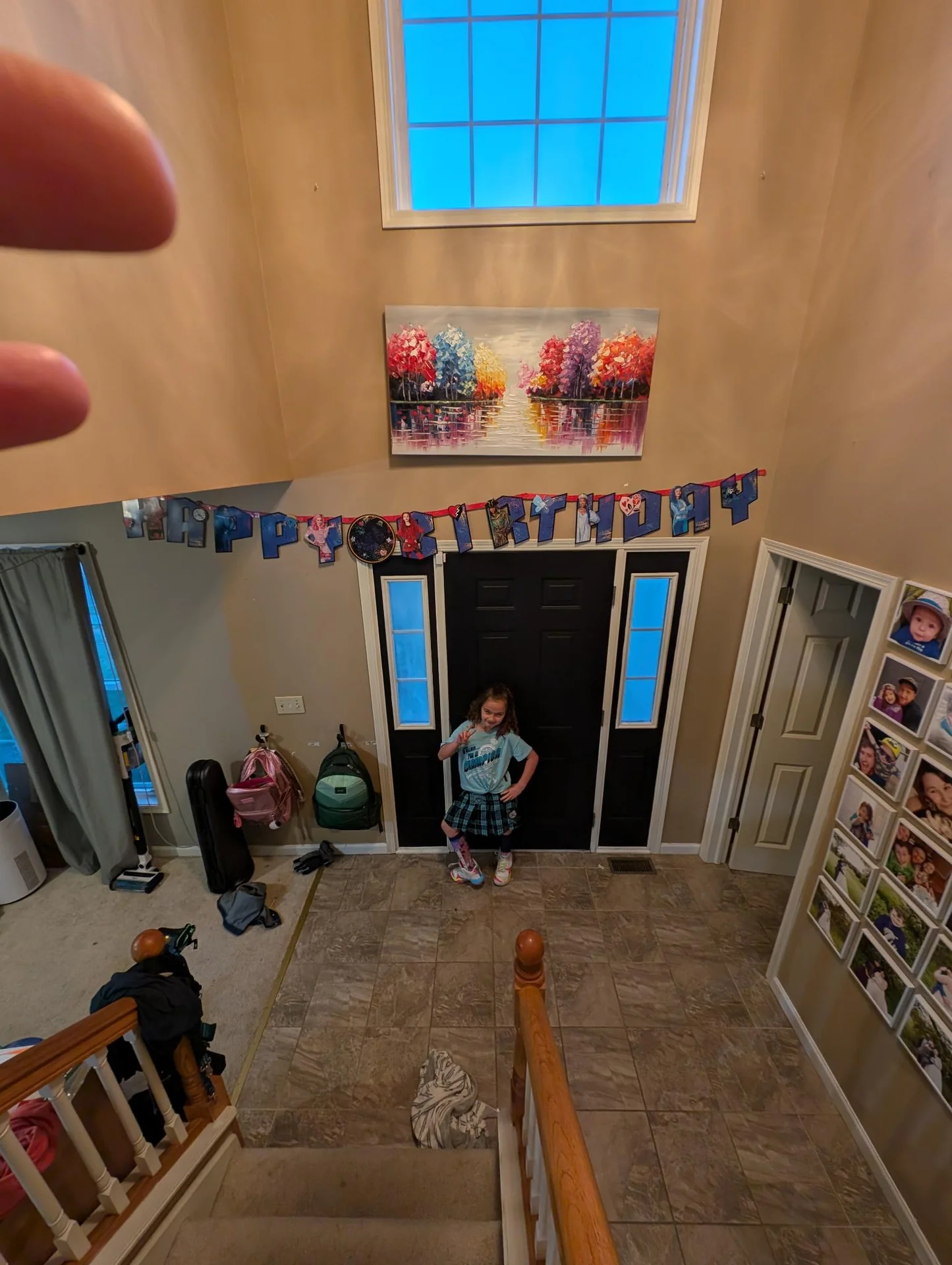 Entryway seen from an upstairs landing