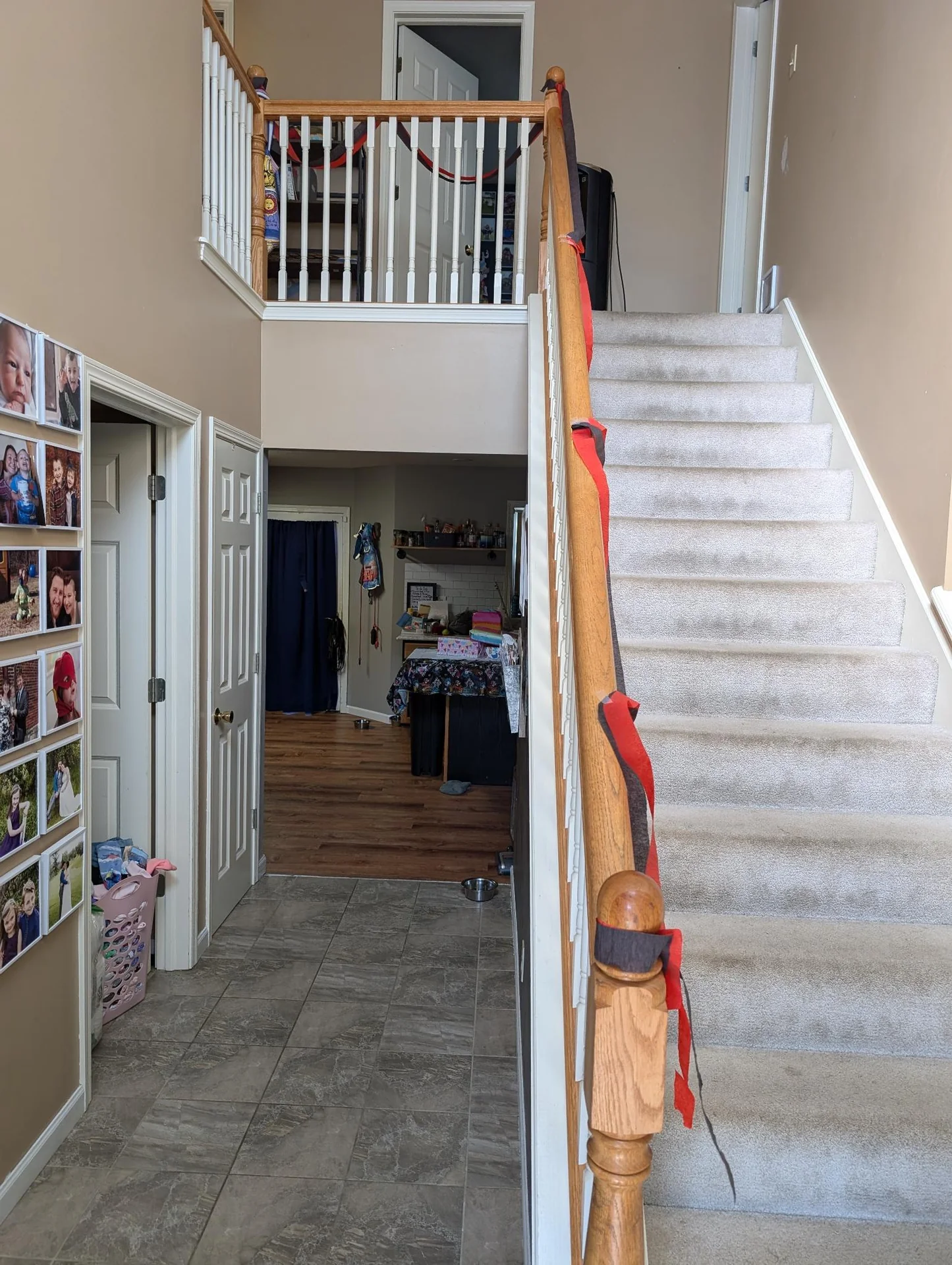 Carpeted staircase and upstairs landing