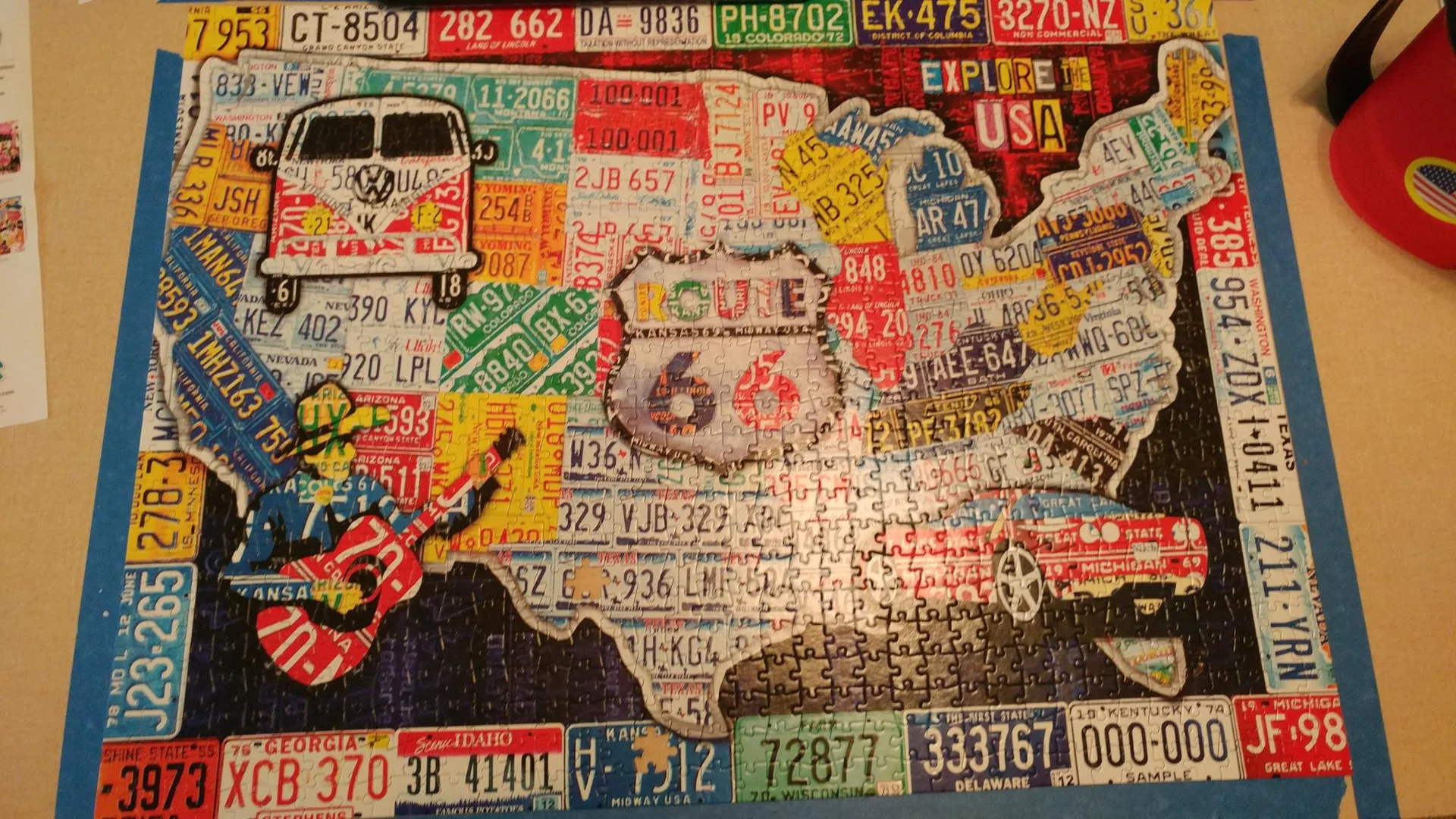 Jigsaw puzzle made of license plates and signs