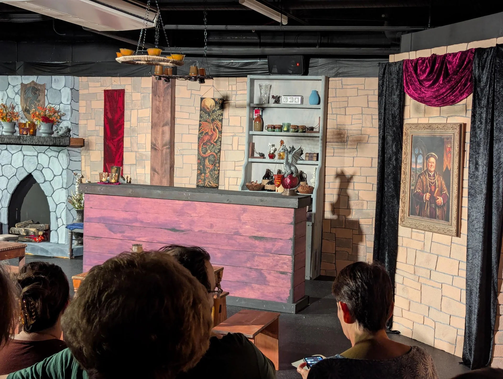 Colorful stage set viewed over an audience