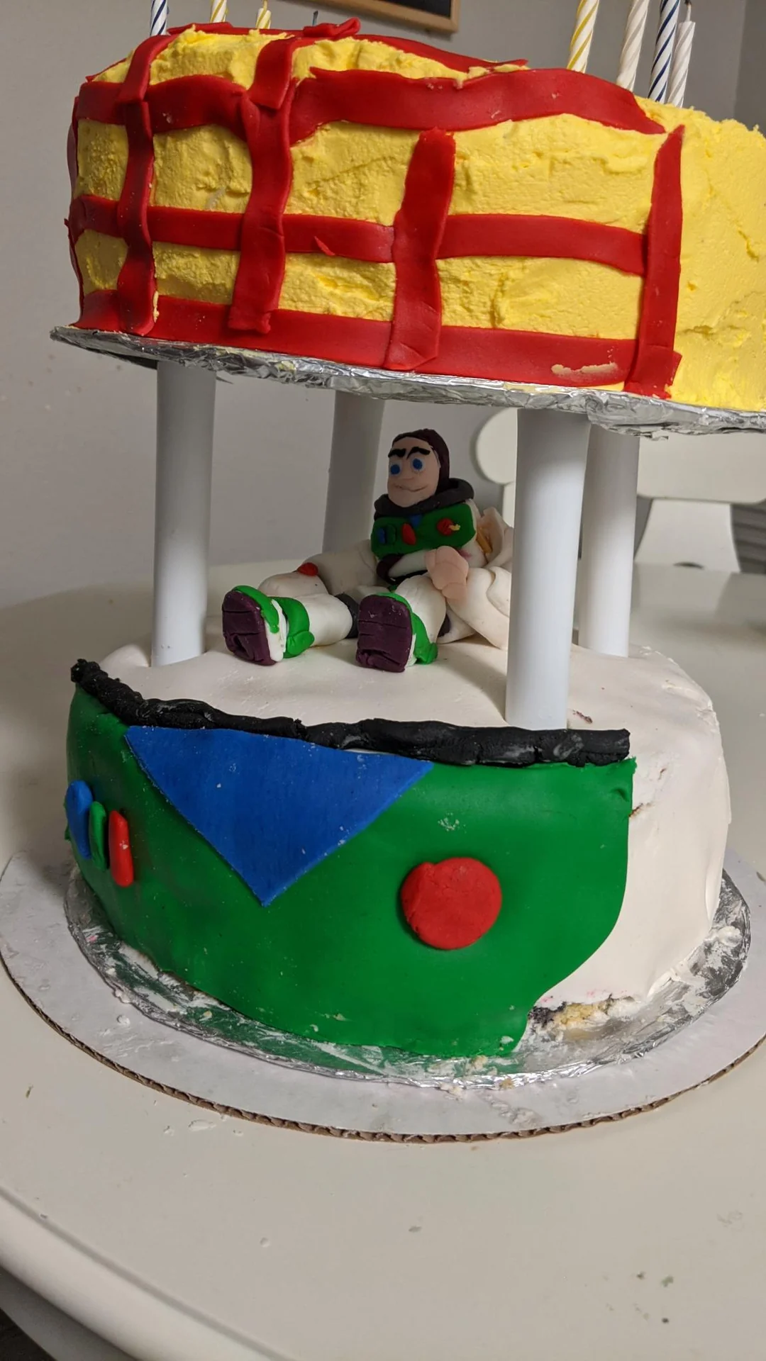 Toy Story birthday cake with a Buzz Lightyear figure