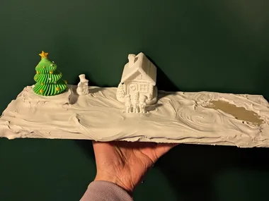 2025 Holiday Diarama 1 I'm building out a diarama with the kids this year, here is the first update. We have a tree, house, snowman, carolers, and flooded it…