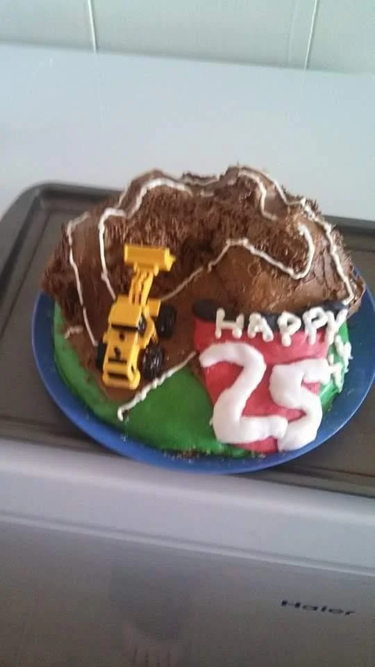 Chocolate dirt cake with a toy excavator