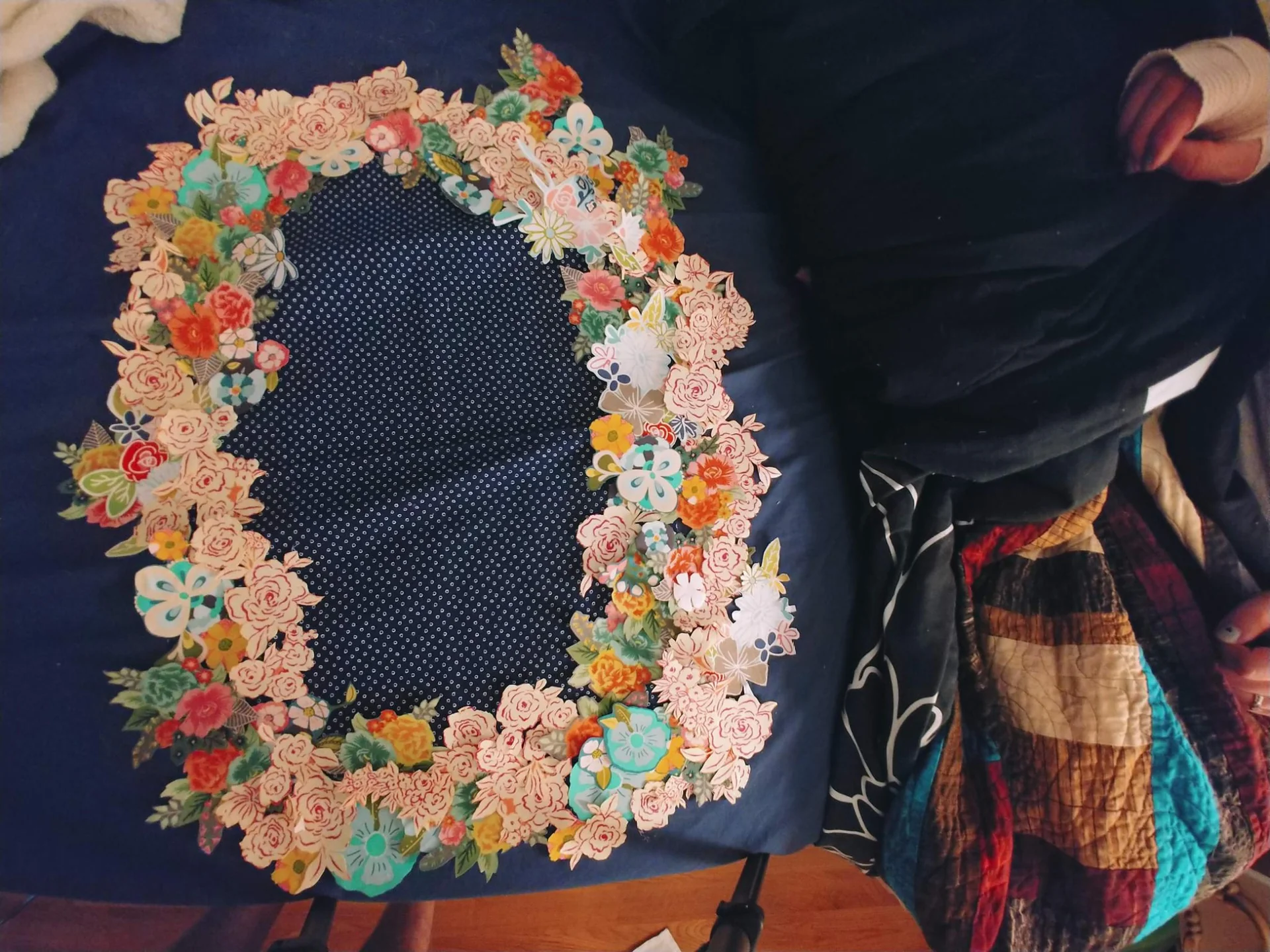 Close view of flowers around a dark quilt center