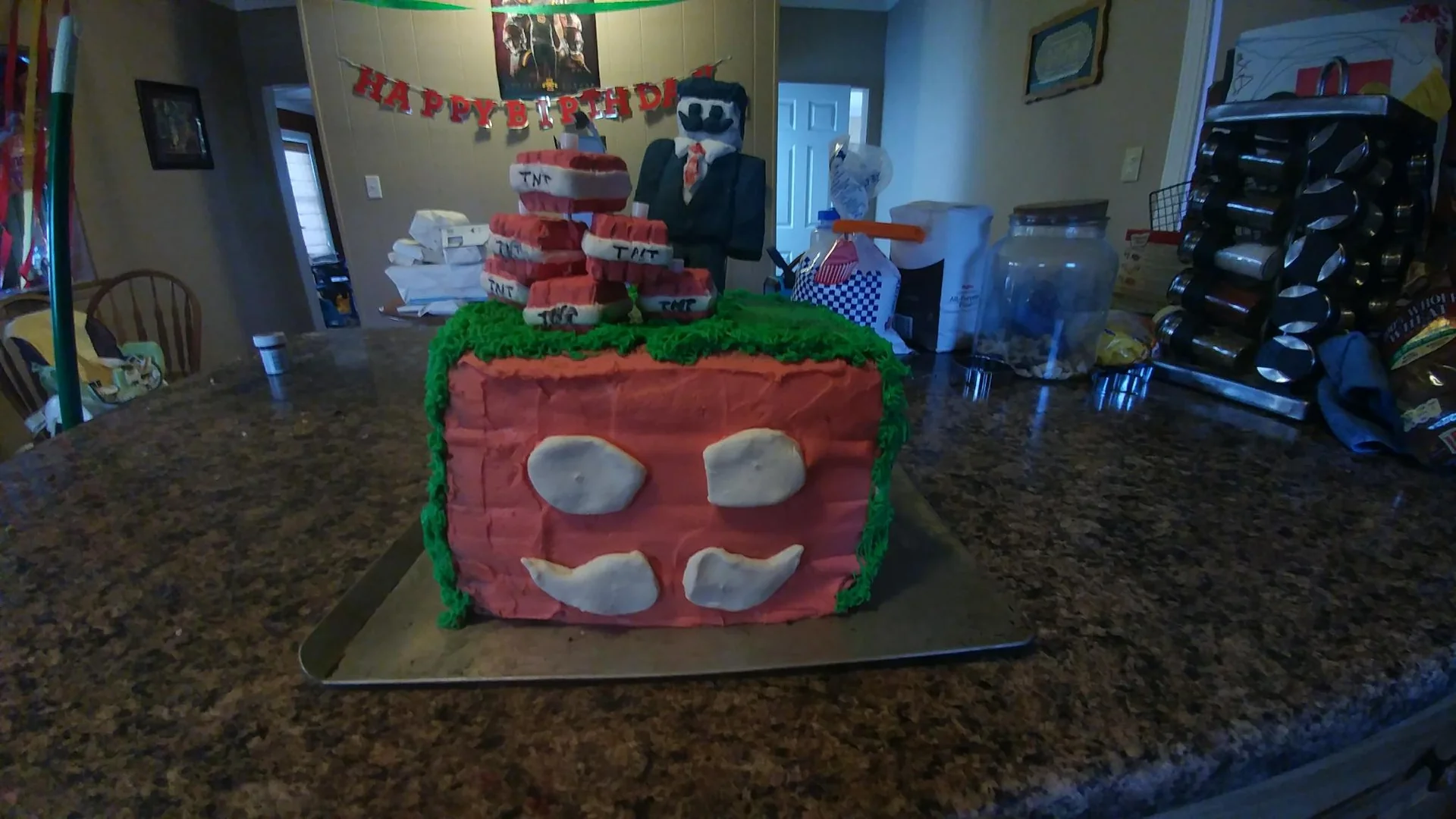 Square Minecraft birthday cake with a pink pixel face